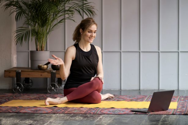 Online Training. Fit Young Woman Excersising At Home, Watching Video Tutorial On Laptop.