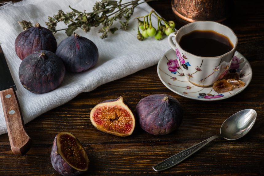Seasonal and exotic fig with coffee cup for breakfast